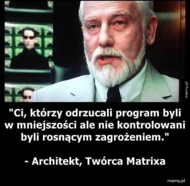 Architekt z filmu Matrix w garniturze i z brodą